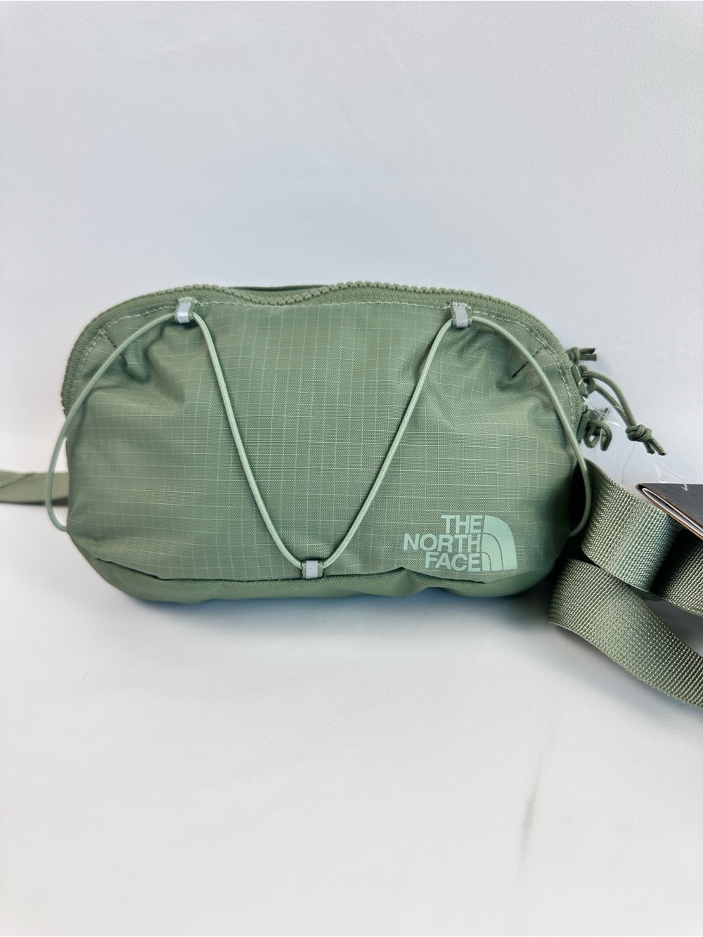 The North Face Sage Green Waist Pack with Bungee Detail